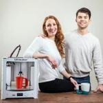 Diana and Allen Arseneau, Jamber cofounders, with a 3-D printer used to prototype the product.